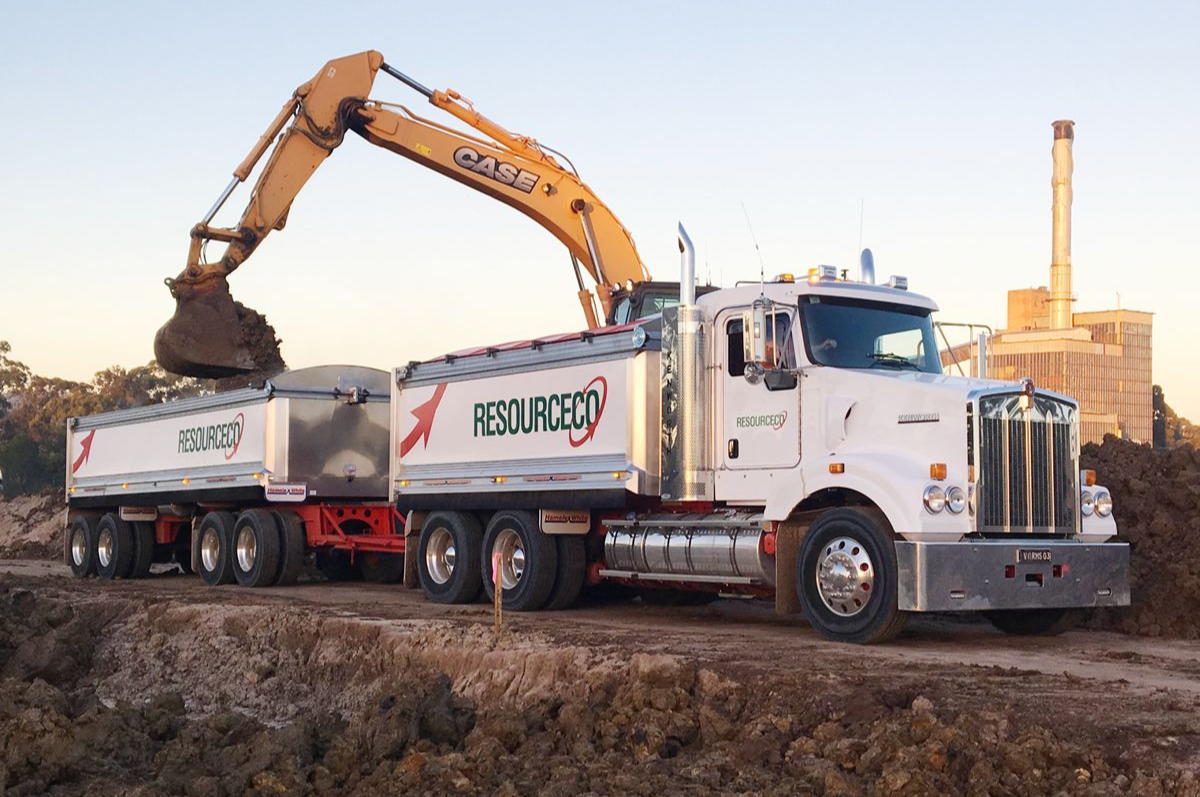 Excavators load material into ResourceCo Trucks